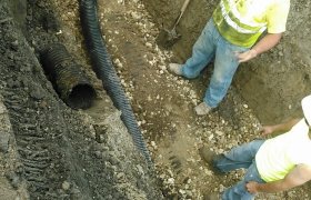 Selly Excavating crew members working in a trench