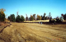 Large excavator area in a rural setting